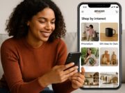 5 Insider Tricks to Win on Amazon’s ‘Shop by Interest’ Young African American woman browsing Amazon’s “Shop by Interest” feature on her smartphone, smiling while viewing curated product categories like HomeGym and Gift Ideas for Dads.